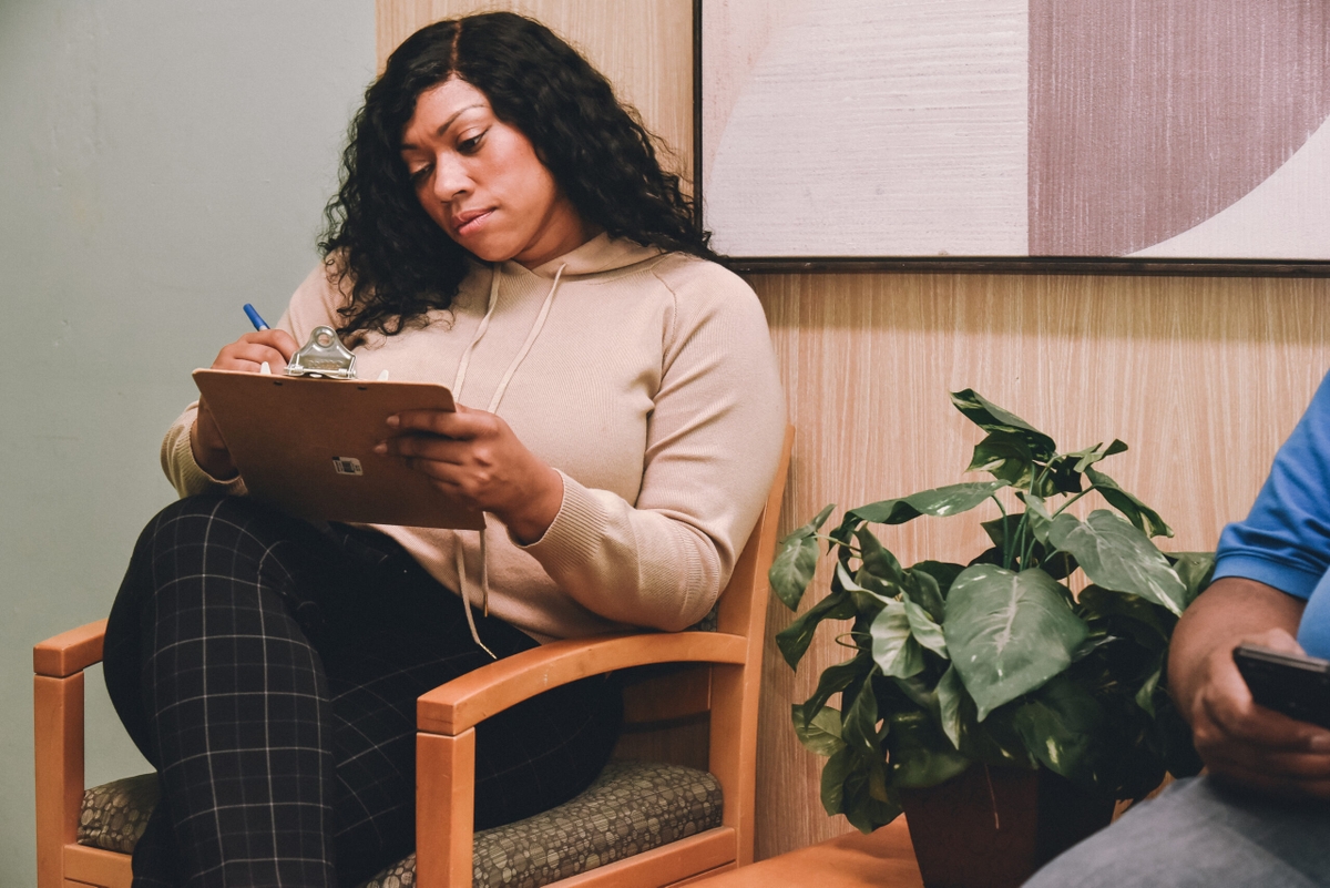 Woman filling out medical forms