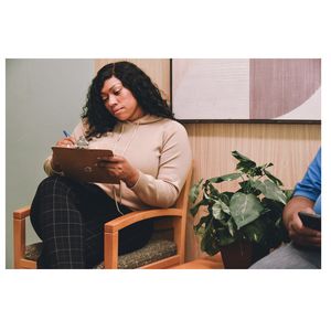 Woman filling out medical forms