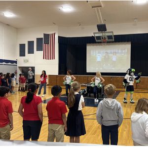 Kids stand go get moving during school event