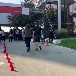 Washington Heart and Stroke Walk participants cross the finish line