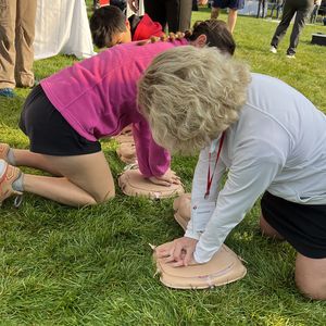 Washington Heart and Stroke Walk CPR chest compression practice