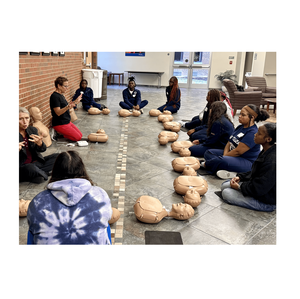 Students participate in a Hands-Only CPR experience