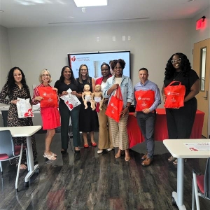 The American Heart Association donates 80 Infant CPR Training Kits to Urban League of Broward County