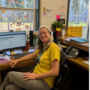 Liz Muzzey at her desk