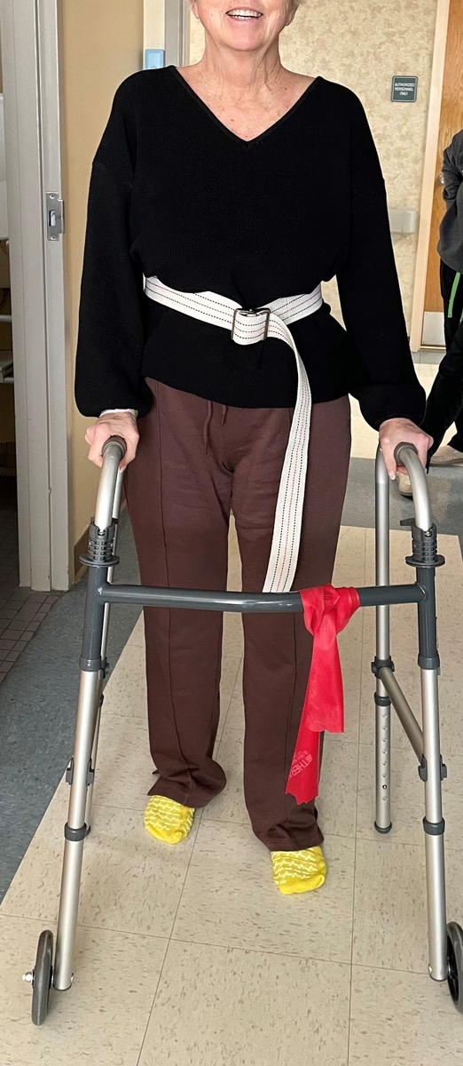 stroke survivor improves balance-walking at rehab center