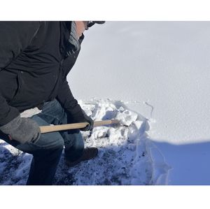 Shoveling snow close up