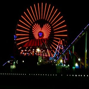 Pacific Park’s Pacific Wheel Ferris wheel, Santa Monica, illuminated with red lighting for National Wear Red Day in 2025
