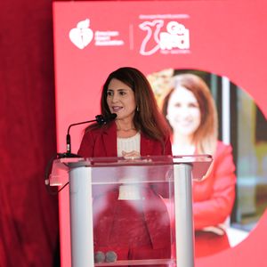 Emily Duran speaks from the stage