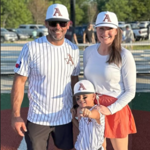 Cole Thompson with his wife, Niki, and son