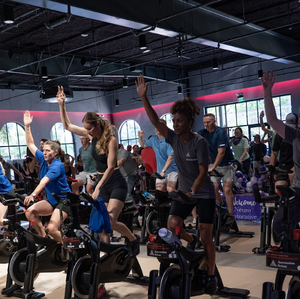 Austin CycleNation riders stretch mid-ride