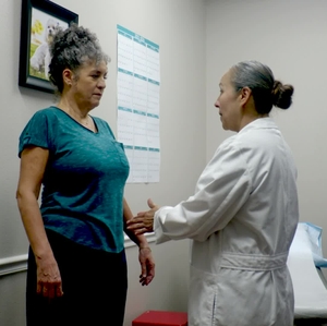 Female patient exam and doctor consultation on CKM