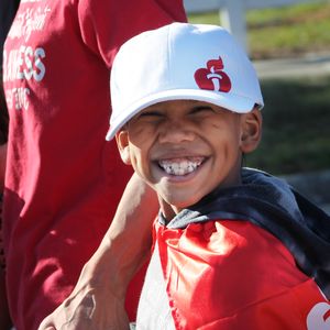 Youth survivor smiling at the Heart Walk