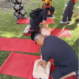 Walkers practice Hands-Only CPR