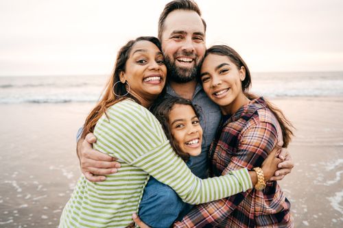 GettyImages-1082467846 - Family at Beach