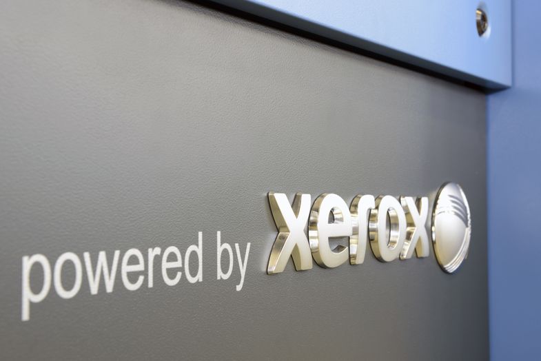 Powered by Xerox badge