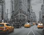 This image by Xerox uses clear dry ink to make the yellow on the taxis stand out.